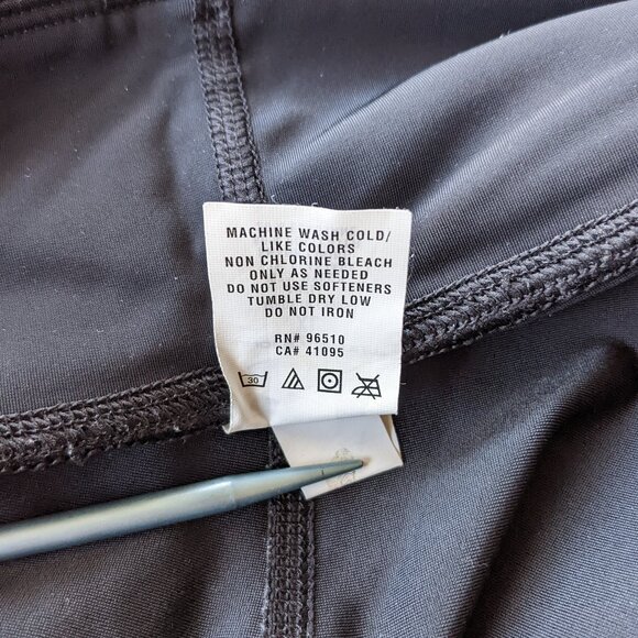 Under Armour black capri leggings with neon green accents - Picture 5 of 11